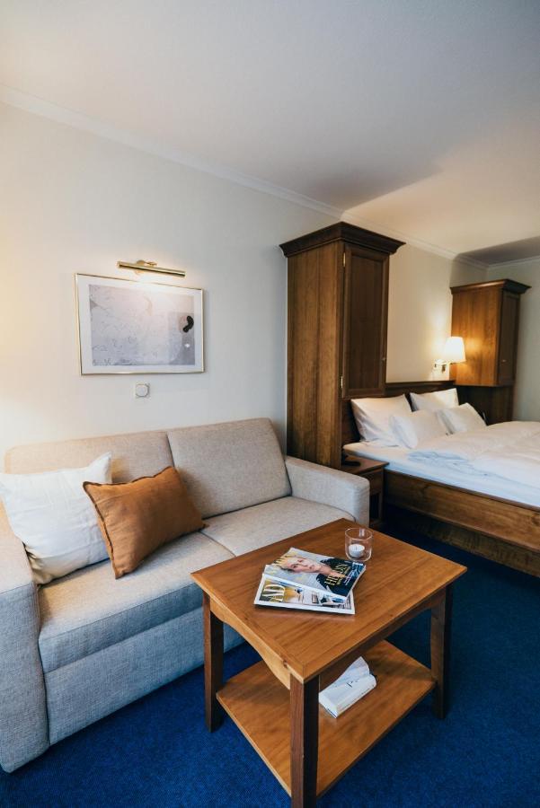 Hotel Reindl Suiten & Appartments บาดฟึสซิง ภายนอก รูปภาพ